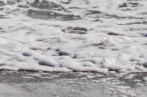 sea foam. splash water photo