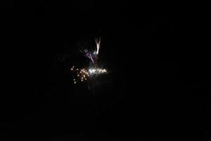 Colorful fireworks on the black sky photo