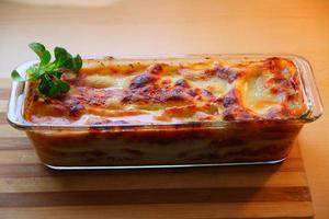 delicious home made lasagna on the table photo