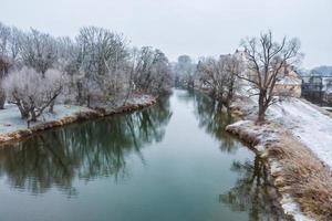 Regensburg City trip in winter time. View from the stone bridge photo