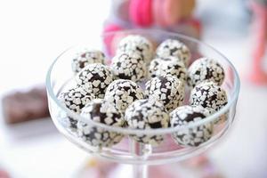 delicious sweets arranged on the table for event reception photo