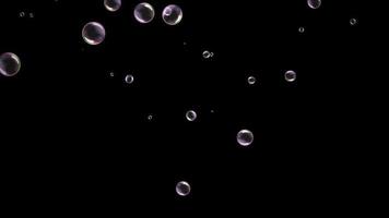 Colorful bubbles falling animation in transparent background video