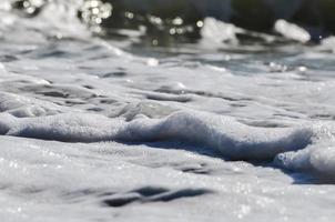 sea foam. splash water photo