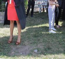 university graduating students are having a photo shooting in the park