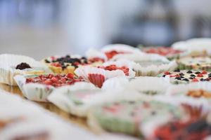 tasty vegan sweets arranged on the table for wedding reception photo