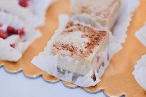 tasty vegan sweets arranged on the table for wedding reception photo