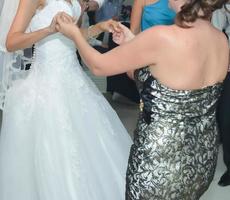 People dancing at the wedding party. focus on legs photo