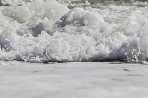 sea foam. splash water photo