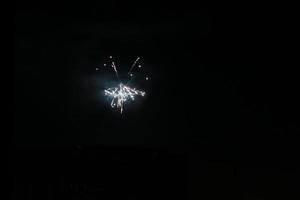 Colorful fireworks on the black sky photo