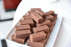 delicious sweets arranged on the table for event reception photo