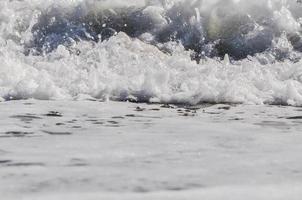 sea foam. splash water photo