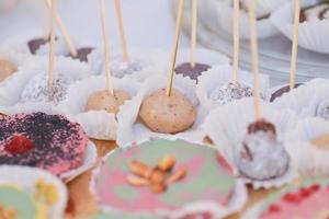 tasty vegan sweets arranged on the table for wedding reception photo