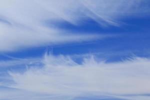 Clear blue sky and white clouds photo