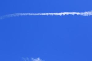 Clear blue sky and white clouds photo