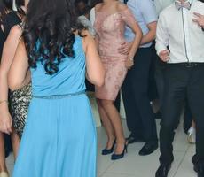 People dancing at the wedding party. focus on legs photo