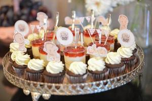Delicious sweets arranged on the table for events reception photo