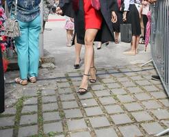 university graduating students are having a photo shooting in the park