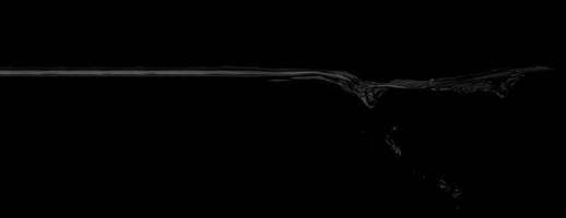 Liquid suface line between underwater and above water with black background. photo