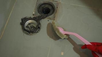 Drain cleaning Clogged and dirty sewer pipes floor drain. photo