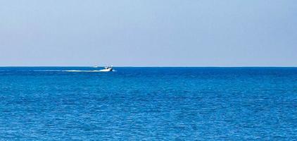 Boats yachts ship jetty beach sea in Puerto Escondido Mexico. photo