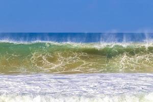 Extremely huge big surfer waves at beach Puerto Escondido Mexico. photo