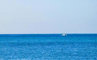 Boats yachts ship jetty beach sea in Puerto Escondido Mexico. photo