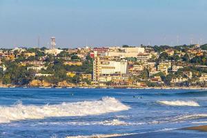 Extremely huge big surfer waves at beach Puerto Escondido Mexico. photo