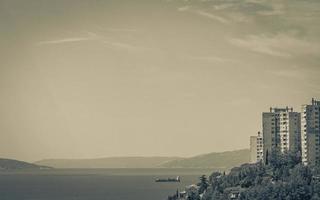 Apartment blocks on the coast in Primorje-Gorski Rijeka Croatia. photo