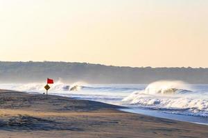 Extremely huge big surfer waves beach La Punta Zicatela Mexico. photo