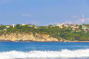 Extremely huge big surfer waves at beach Puerto Escondido Mexico. photo