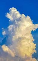 Explosive cloud formation cumulus clouds in the sky in Mexico. photo