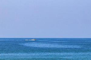 Boats yachts ship jetty beach sea in Puerto Escondido Mexico. photo