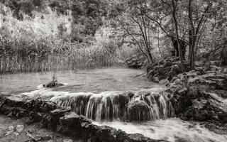 Plitvice Lakes National Park waterfall turquoise blue green water Croatia. photo