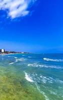 Tropical caribbean beach clear turquoise water Playa del Carmen Mexico. photo