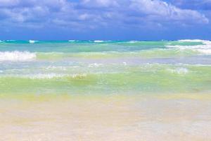 Tropical caribbean beach clear turquoise water Playa del Carmen Mexico. photo