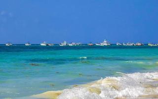 Boats yachts ship jetty beach in Playa del Carmen Mexico. photo