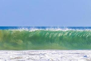 Extremely huge big surfer waves at beach Puerto Escondido Mexico. photo