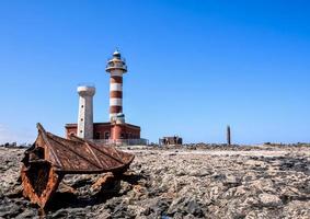 Lighthouse by the sea photo