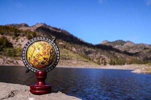 Globe at the seaside photo