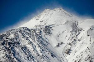 Snowy mountains view photo