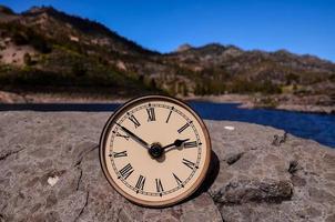 Clock on the ground photo