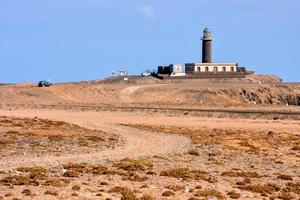 Lighthouse by the sea photo