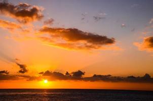 Sunset over the sea photo