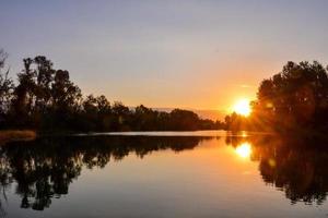 Sunset over the lake photo