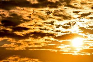 Cloudy sky at sunset photo