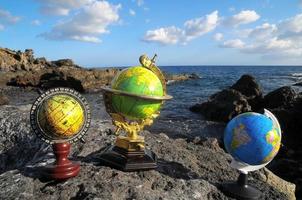 Globes on a rock photo