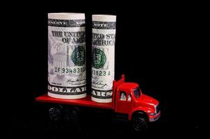 Toy truck carrying cash photo