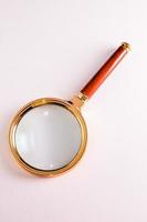 Isolated magnifying glass photo