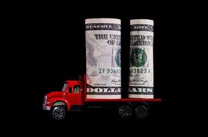 US Dollars on a toy truck photo