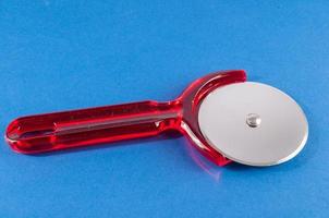 Isolated pizza cutter photo